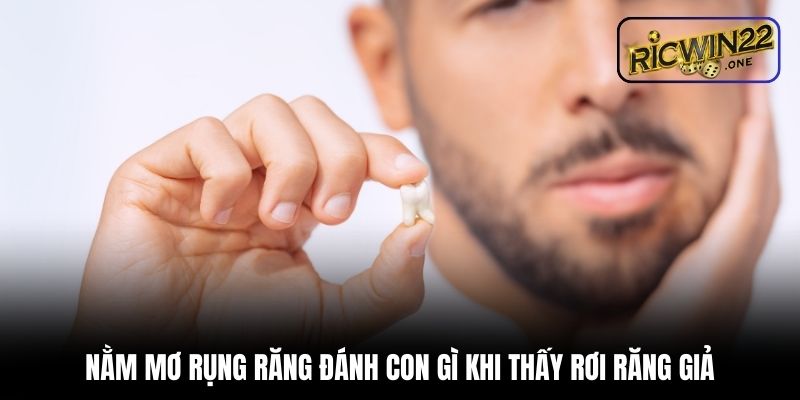 Nằm mơ rụng răng đánh con gì khi thấy rơi răng giả